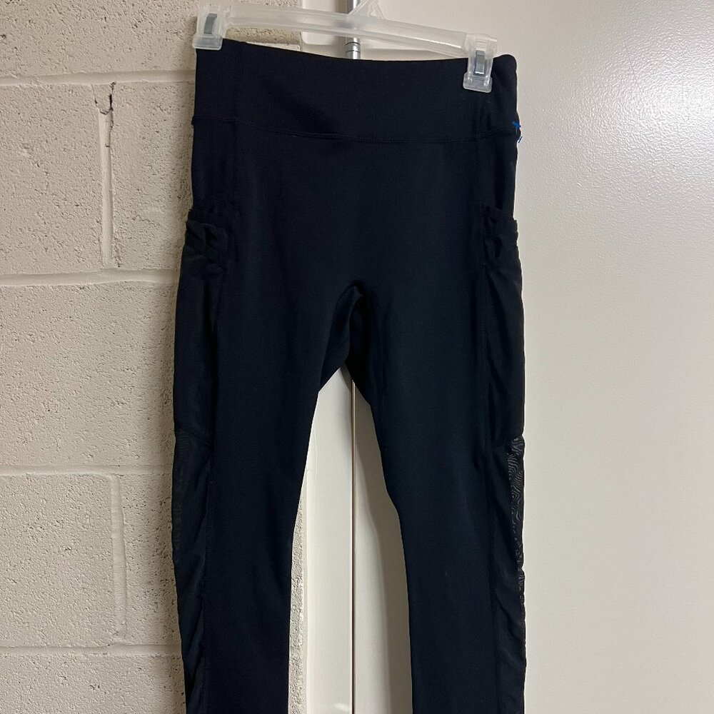 Fabletics On the Go power hold high waisted black leggings with mesh side panels